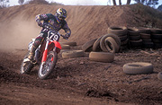 Australia, australian, Sport pictures, Sports, outdoors, man, men, male, males, helmet, helmets, speed, dust, dusty, tyre, tyres, dirt, dirt bike, dirt bikes, race, races, racing, sign, signs, motorbike, motorbikes, dirt bike racing, dirtbike racing, motor racing, motocross, motorcross, motocross racing, motorcross racing.