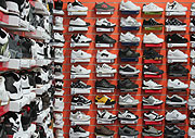Consumer product, Consumer products, Shoe shop, Shoe shops, shop, shops, store, stores, shelf, shelves, Shoe, Shoes, footwear, label, labels, running, running shoes, jogging, jogging shoes, sport, sports shoes.