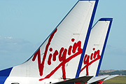 Australia, New South Wales, sydney, sydney airport, airport, airports, transport, transportation, vehicle, vehicles, plane, planes, aircraft, aircrafts, aeroplane, aeroplanes, virgin, virgin blue, sign, signs, advertise, advertises, advertising.