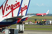 Australia, New South Wales, sydney, sydney airport, airport, airports, transport, transportation, vehicle, vehicles, plane, planes, aircraft, aircrafts, aeroplane, aeroplanes, virgin, virgin blue, sign, signs, advertise, advertises, advertising.