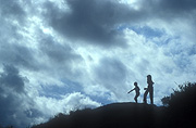 Australia, auburn, Atmosphere, Meteorology, climate, weather, cloud, clouds, sky, skies, sky scenes, storm, storms, storm cloud, storm clouds, silhouettes, children, silhouette, hill, hills.