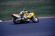 Australia, australian, Sport pictures, Sports, outdoors, nsw, new South Wales, sydney, eastern creek, man, men, male, males, helmet, helmets, speed, race, races, racing, motorbike, motorbikes, motorbike racing.