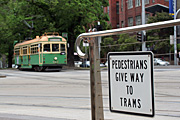 Australia, vic, victoria, melbourne, traffic, pedestrian, pedestrians, people, sign, signs, transport, transportation, vehicle, vehicles, tram, trams, fence, fences.
