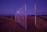 Australia, Australian, Australian desert, Australian deserts, desert, deserts, desert scenes, pest, pests, dingo, dingos, dingoes, dog, dogs, fence, fences, dingo, dingo fence, dog fence, wild, wild dog, wild dogs, feral, feral animal, feral animals, feral dog, feral dogs, native dog, native dogs, fence, fences, dingo fence, outback, australian outback, outback australia, Queensland, Qld, wire fence, wire fences.