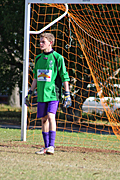 People, child, children, puberty, australia, Sport pictures, Sports, football, goal, goals, goalkeeper, goalkeeper, people, child, children, puberty, male, males, teenager, teenagers, adolescent, adolescents, teenage boy, teenage boys, boy, boys, uniform, uniforms, goal post, goal posts, goalpost, goalposts, hat, hats.