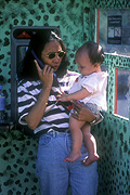 People, child, Children, female, females, family, families, woman, women, baby, babies, window, windows, telephone, telephones, telephone box, telephone boxes, phone, phones, communication.