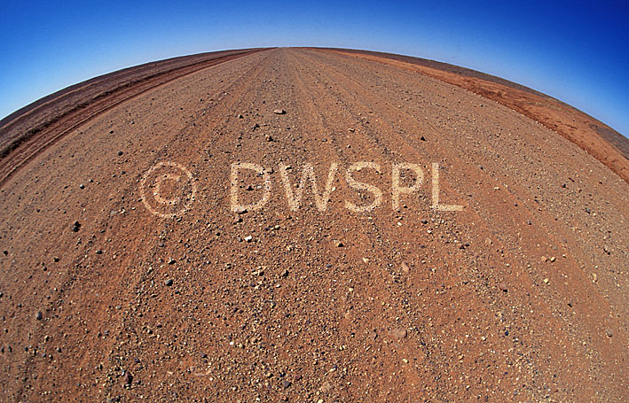 stock photo image: Australia, nt, northern territory, outback, outback australia, australian outback, road, roads, unsealed, unsealed road, unsealed roads, dirt, dirt road, dirt roads.