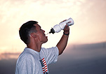 Man, men, male, males, drink, drinks, drinking, water, bottle, bottles, plastic bottle, plastic bottles, plastic, drink bottle, drink bottles.