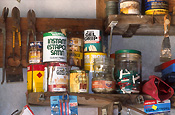 shed, sheds, tool shed, tool sheds, paint, paints, tin, tins, paint tin, paint tins, tin of paint, tins of paint, jar, jars, glass jar, glass jars, shelf, shelves, label, labels.