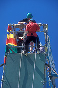 Australia, child, children, boy, boys, rope, ropes, abseil, abseils, abseiling, rope, ropes, helmet, helmets, hat, hats, outdoors, Sport pictures, Sports, descend, descends, descending, scaffold, scaffolds, scaffolding.