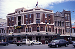 Australia, NSW, Sydney, city, cities, traffic, road, roads, sealed road, sealed roads, hotel, hotels, pub, pubs, courthouse hotel, Taylor square, Oxford Street, architecture, intersection, intersections, crossroad, crossroads.