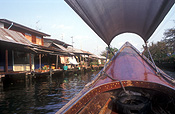 Asia, thailand, bangkok, river, rivers, transport, transportation, vehicle, vehicles, transportation, boat, boats, boating, slum, slums, water, Royalty Free Image