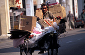 Asia, Asian, Southeast Asia, South East Asian, SE Asia, Malaysia, people, man, men, rubbish, garbage, garbage man, garbage men, occupation, occupations, cart, carts, cardboard, paper, box, boxes, cardboard box, cardboard boxes.