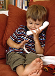 People, child, children, boy, boys, male, males, telephone, telephones, phone, phones, communication, communicate, communicates, communicating, AM04,