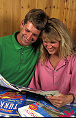 People, couple, couples, holiday, holidays, vacation, vacations, magazine, paper, magazines, man, men, male, males, woman, women, female, females, indoors, smile, smiles, smiling, happy, happiness, portrait, portraits, people, Australia, Sport pictures, Sports, balloon images, hot air balloons