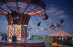Europe, Western Europe, UK, Britain, British Isles, England, United Kingdom, Great Britain, swing, swings, Fair, Fairs, Fairground, Fairgrounds, fairground ride, fairground rides, fun park, fun parks, fun spot, fun spots, theme park, theme parks, amusement, amusement ride, amusement rides, amusement park, amusement parks, Cheshire, children, people, child, spin, spins, spinning, dizzy, dizziness.