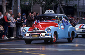 Australia, Anzac Day, Anzac Days, crowd, crowds, Anzac Day march, Anzac Day Marches, digger, diggers, Australian digger, Australian diggers, soldier, soldiers, returned soldier, returned soldiers, veteran soldier, veteran soldiers, veteran, veterans, car, cars, fj holden, fj holdens, holden, holdens, flag, flags, taxi, taxis, cab, cabs.