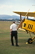 Australia, New South Wales, NSW, vintage plane, vintage planes, biplane, biplanes, bi-plane, bi-planes, transport, transportation, vehicle, vehicles, plane, planes, aircraft, aircrafts, tiger moth, tiger moths, man, men, male, males, outdoors, aeroplane, aeroplanes, light, airport, airports, aviation, blade, blades, propellor, propellors.