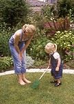 Mother, mothers, parent, parents, parenting, parenthood, people, child, children, girl, girls, female, females, girl, girls, toddler, toddlers, mother and child, mother and children, mother with child, mothers with children, garden, gardens, gardener, gardeners, gardening, rake, rakes, garden rake, garden rakes, outdoors, AM04,