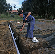 People, Man, Men, Male, Males, Occupation, Occupations, plumber, plumbers, plumbing, pipe, Pipes, building industry, construction industry, drain, drains, drainage, pipeline, pipelines, house, houses, housing, australia, construction, construction site, construction sites, australia, outdoors, water pipe, water pipes.