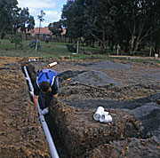 People, Man, Men, Male, Males, Occupation, Occupations, plumber, plumbers, plumbing, pipe, Pipes, building industry, construction industry, drain, drains, drainage, pipeline, pipelines, australia, house, houses, housing, construction, construction site, construction sites, australia, outdoors, water pipe, water pipes.