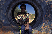 Australia, Anmatyerr, anmatyerr country, community, communities, australian, australian people, child, Children, boy, boys, male, males, aborigine, aborigines, aboriginal, aboriginals, aboriginal people, aboriginal child, aboriginal children, aborigine people, aborigine child, aborigine children, indigenous, indigenous people, Yuwelamu, Mount Allan, Northern Territory, NT, hat, hats, baseball hat, baseball hats, friend, friends, tyre, tyres.