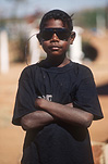 People, child, children, puberty, australia, Anmatyerr, anmatyerr country, community, communities, australian, australian people, child, Children, boy, boys, male, males, teenager, teenagers, teenage boy, teenage boys, aboriginal, aboriginals, aborigine, aborigines, aboriginal child, aboriginal children, aborigine child, aborigine children, indigenous, indigenous people, NY, Yuelamu, Mount Allan, Australia, adolescent, adolescents, sunglasses, pair of sunglasses, glasses, pair of glasses.