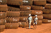 Industry, wa, western australia, australia, newman, mt newman, mount newman, tyre, tyres, truck, trucks, transport, transportation, vehicle, vehicles, transporation, man, men, male, males, outdoors, sign, signs.