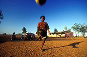 Australia, Anmatyerr, anmatyerr country, community, communities, australian, australian people, Child, Children, boy, boys, male, males, male, males, aborigine, aborigines, aboriginal, aboriginals, aboriginal people, aboriginal child, aboriginal children, aborigine people, aborigine child, aborigine children, indigenous, indigenous people, indigenous child, indigenous children, Yuelamu, Yuelamu community, Mt Allan, Mount Allan, Northern Territory, NT, Australia, football, footballs, ball, balls, teenager, teenagers, teenage boy, teenage boys, adolescent, adolescents.