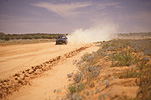 Road, roads, unsealed road, unsealed roads, dirt road, dirt roads, outback, australian outback, outback australia, dirt track, dirt tracks, car, cars, vehicle, vehicles, dust, dusty, Qld, Queensland, Australia, dust, dusty.