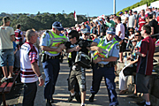 Australia, New South Wales, police, police force, emergency service, emergency services, law, law enforcer, law enforcement, law and order, law, law enforcer, law enforcement, law and order, sydney, football, football game, football games, arrest, arrests, arresting, crowd, crowds, helmet, helmets, uniform, uniforms.