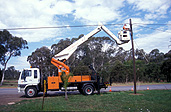 Australia, New South Wales, nsw, power, power line, power lines, power supply, electricity, telstra, telephone, telephones, telephone line, telephone lines, communication, man, men, male, males, occupation, occupations, cherrypicker, cherrypickers, cherry picker, cherry pickers, machinery, transport, transportation, vehicle, vehicles, road, roads, sealed road, sealed roads, sydney, cherry-picker, cherry-pickers.