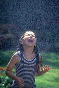 People, Child, children, girl, girls, outdoors, sprinkler, sprinklers, garden sprinkler, garden sprinklers, water, spray, sprays, Australia, Sport pictures, Sports, balloon images, hot air balloons