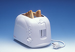 Consumer product, consumer products, kitchen appliance, kitchen appliances, toast, toasted bread, toaster, toasters, bread, slices of bread, sliced bread, electrical device, electrical devices, electric, electrical, electric plug, electric plugs, electrical plug, electrical plugs, electricity, Royalty Free Image