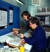 People, child, children, puberty, man, men, male, males, architect, architects, architecture, desk, desks, occupation, occupations, office, offices, paper, plan, plans, architects plan, architects plans, drawing, drawings, architects drawing, architects drawings, girl, girls, female, females, teenager, teenagers, adolescent, adolescents, teenage girl, teenage girls, indoors, Royalty Free Image
