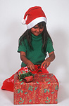 People, child, children, female, females, girl, girls, Christmas, Christmas time, present, presents, gift, gifts, christmas present, christmas presents, hat, hats, christmas hat, christmas hats, santa hat, santa hats, christmas paper, wrapping paper, package, packages, box, boxes, Australia, Sport pictures, Sports, balloon images, hot air balloons