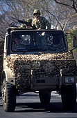 Armed forces, army, uniform, uniforms, army uniform, army uniforms, helmet, helmets, military, defence, defence forces, armed services, occupation, occupations, outdoors, man, men, male, males, service, services, gun, guns, gun, guns, weapon, weapons, weaponry, artillery, australian army, tranport, truck, trucks, australia, sa, south australia, soldier, soldiers, camouflage, camouflages, camouflaged, wheel, wheels, headlight, headlights.