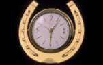 Time, time keeping, time-keeping, clock, clocks, horseshoe, horseshoes, horse shoe, horse shoes, horse-shoes, consumer products.