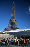 France, Europe, French, Architecture, French architecture, Building, Buildings, Paris, Eiffel, Eiffel Tower, Tower, Towers, Alexandre Eiffel, Alexandre Gustave Eiffel, Alexandre-Gustave Eiffel, Iron, Metal, Metal structure, Metal structures, café, cafes, sky, skies, blue sky, blue skies, umbrella, umbrellas, FF25,