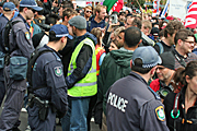Australia, New South Wales, police, police force, emergency service, emergency services, law, law enforcer, law enforcement, law and order, gun, guns, weapon, weapons, sydney, people, apec, crowd, crowds, apec demonstration, demonstrator, demonstrators, demonstration, demonstrations, protest, protests, asia pacific economic cooperation.