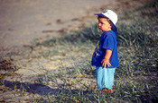 People, child, children, toddler, toddlers, boy, boys, male, males, beach, beaches, hat, hats, outdoors, beach, beaches, sand, coast, coastal.