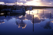Australia, Tasmania, Tassie, Tas, Strahan, Marina, marinas, moored, mooring, moorings, boat, boats, boating, dusk, mood, mood scene, mood scenes, water, cloud, clouds, reflection, reflections, coast, coasts, coastal, coastline, coastlines, dock, docks, dusk.