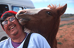 Man, Men, Male, Males, Animal, Animals, Horse, horses, people and animals, glasses, pair of glasses, spectacles, pair of spectacles, eye, eyes, hat, hats, australia, northern territory, nt, people, outdoors, smile, smiles, smiling, happy, happiness, portrait, portraits, people.