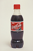 Bottle, bottles, plastic, plastic bottle, plastic bottles, drink, drinks, soft drink, soft drinks, coke, coca-cola, coca cola, sign, signs, label, labels.