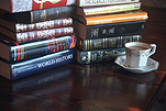 Book, books, paper, tea, cup, cups, tea cup, tea cups, teacup, teacups, cup of tea, cups of tea, beverage, beverages, china.