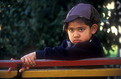 Australia, Australian, people, child, children, boy, boys, male, males, playground, playgrounds, childrens playground, childrens playgrounds, equipment, playground equipment, apparatus, playground apparatus, outdoors, hat, hats.