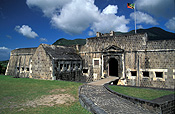 Caribbean, Caribbean Islands, Saint Kitts, St Kitts, Brimstone Hill, Brimstone Hill Fortress, Fort, Forts, Fortress, Fortresses, hill, hills, green hill, green hills, coast, coasts, coastline, coastlines, canon, canons, cannon, cannons, Gun, guns, weapon, weapons, weaponry, artillery, military, war, flag, flags, cloud, clouds, FF25,