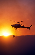 Transport, transportation, vehicle, vehicles, aviation, Fire, Fires, helicopter, helicopters, chopper, choppers, bucket, buckets, bushfire, bushfires, disaster, disasters, natural disaster, natural disasters, emergency vehicle, emergency vehicles, sunset, sunsets, sunrises and sunsets, mood, mood scene, mood scenes, sydney bushfire, sydney bushfires, rotor, rotors, rotor blade, rotor blades, blade, blades.