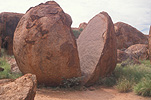 Australia, Nt, Northern Territory, wauchope, stuart, stuart highway, vegetation, Devils Marbles, Devils Marbles Conservation Reserve, devil's marbles, rock, rocks, split rock, split rocks, granite, granite boulder, granite boulders, rock, rocks, weathered rock, weathered rocks, cracked rock, cracked rocks.