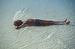 Africa, zanzibar, zanzibar island, beach, beaches, water, coast, coasts, coastal, coastline, coastlines, man, men, old man, old men, elderly man, elderly men, elderly people, old people, rest, rests, resting, relax, relaxes, relaxing, people sleeping, man sleeping men sleeping, sleep, sleeps, sleeping, people, old, aged, elderly, outdoors, people sleeping.